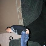 Carlos Mencia showing his ass in Kuwait - photo by Sam Slovick Carlos Mencia showing his ass in Kuwait - photo by Sam Slovick